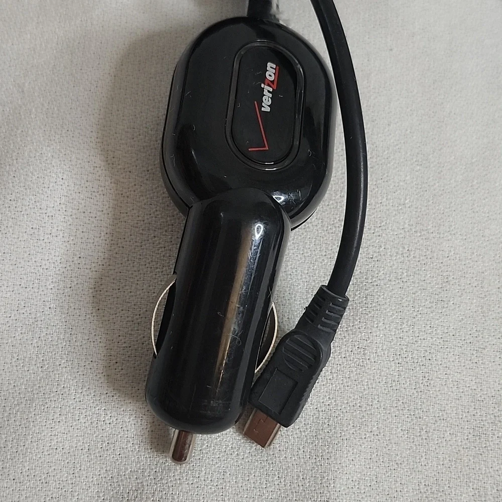 Assorted Vintage Electronic Charging Cables and Cases